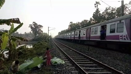 The little girl waving her hands by saying 'HELLO' to the passenger