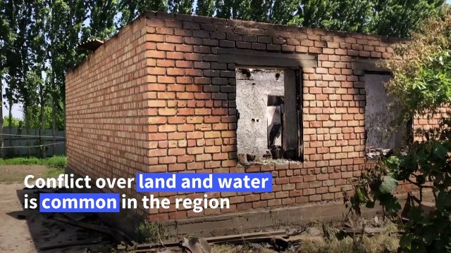 Kyrgyzstan residents pick through rubble after homes destroyed in clashes