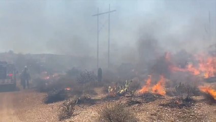 Firefighters battle wind-driven blazes across the Southwest