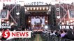 Music returns to 'almost virus-free' Wuhan