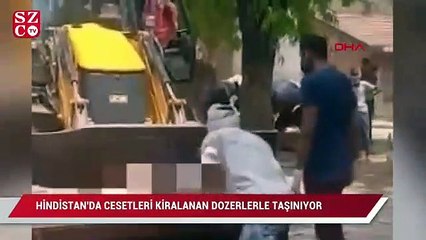 Hindistan'da Kovid-19 kurbanlarının cesetleri kiralanan dozerlerle taşınıyor