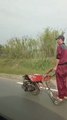 Man Amuses Passerby While Riding Makeshift Engine Powered Wheelbarrow