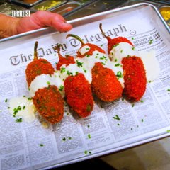 These Jalapeño Poppers are Covered in Hot Cheetos