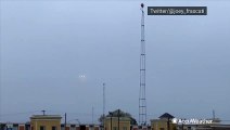 Plane emerges from low clouds on approach to New York