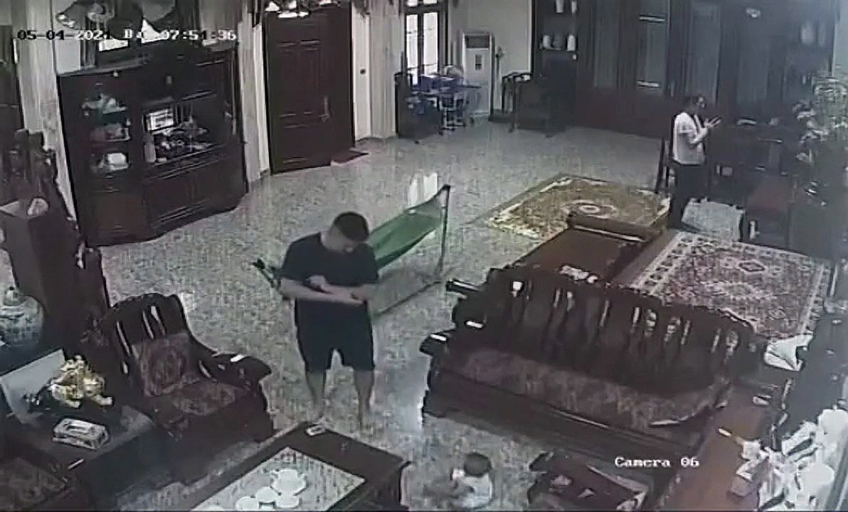 Grandpa Balances Tipping Baby