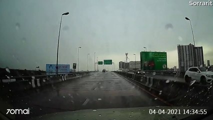 Slippery Corner Sends Car Bouncing Between Barriers
