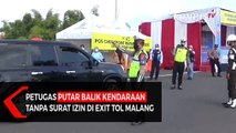 Petugas Putar Balik Kendaraan Tanpa Surat Izin di Exit Tol Malang
