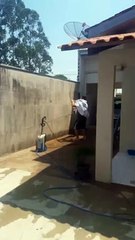 Husband Gets Down as He Hangs Clothes Up