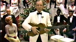 John Banner Werner Klemperper and then Robert Clary sing Christmas Carols