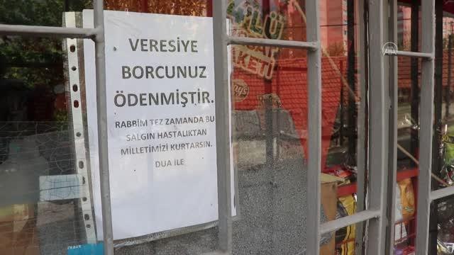 Bir hayırsever veresiye defterlerini satın alarak vatandaşların borçlarını sildirdi