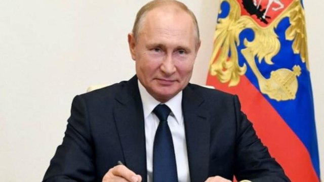 Putin says Russian vaccines reliable as AK-47