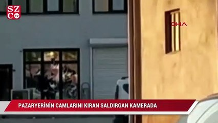 Pazaryerinin camlarını kıran saldırgan kamerada