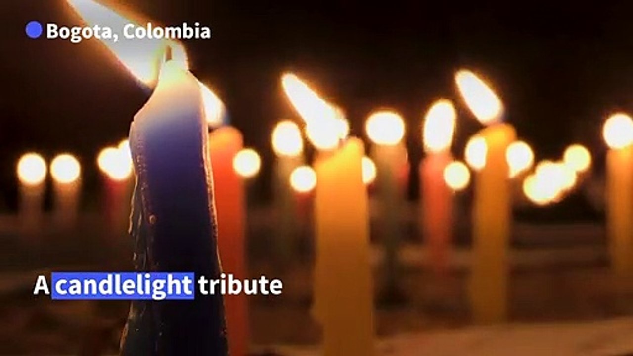 Protesters at Colombian capital light torches and candles at vigil