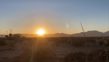 Spring sun rises over a New Mexico desert