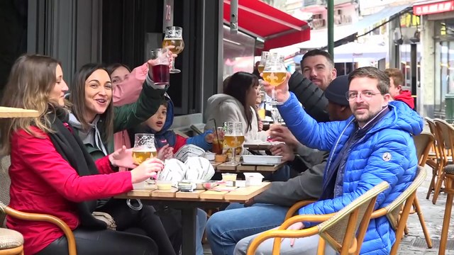 Belgian terraces and Greek beaches invite visitors as lockdown measures ease