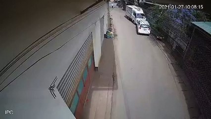 Runaway Truck Pushes Parked Car Into Building
