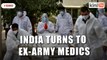 India turns to ex-army medics as Covid-19 surge sparks calls for lockdown