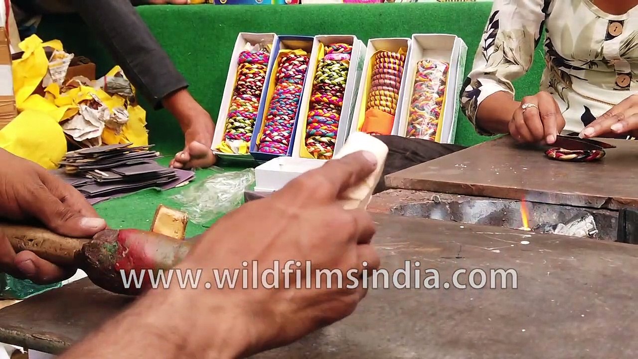 Lacquer bangle being made _ up close and in slow motion
