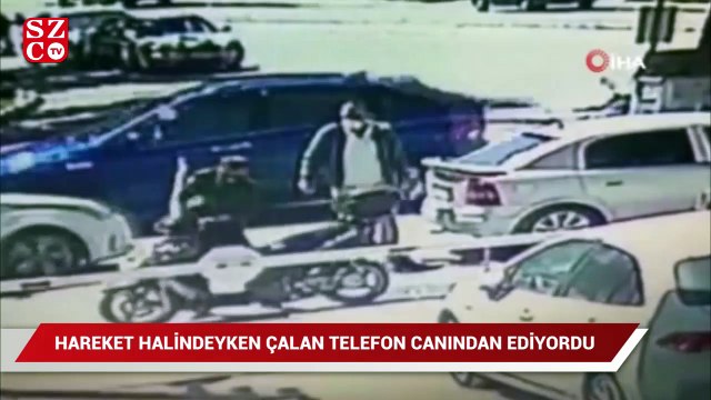 Hareket halindeyken çalan telefonu motosiklet sürücüsünü canından ediyordu
