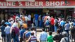 People gathered to buy liquor as shops reopened