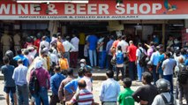 People gathered to buy liquor as shops reopened