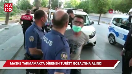 Maske takmamakta direnen turist gözaltına alındı