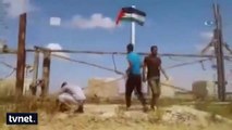 İsrail'in askeri kapısına, Filistin bayrağını astılar!