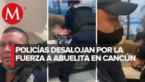 Policías de Cancún someten a mujer para desalojarla de inmueble