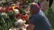 Dolor y lágrimas en la vigilia por los 9 fallecidos en el tiroteo en una escuela rusa