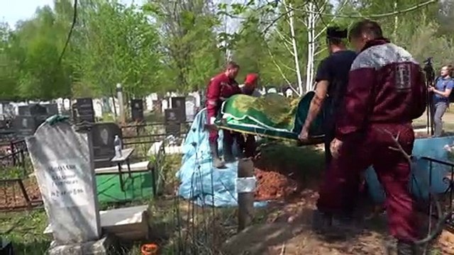 Mourners attend funeral of teacher killed in Russian school shooting