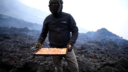 Order up! Man cooks pizza on volcano