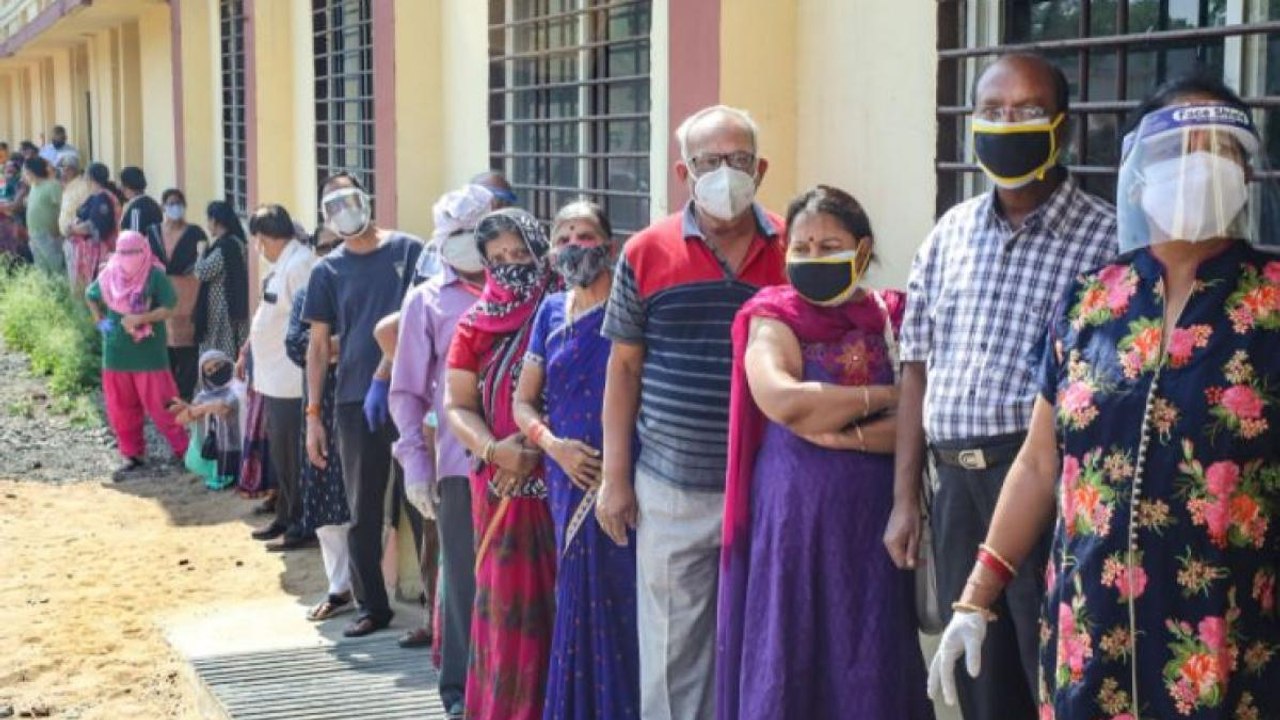 Long queue outside centres as people wait to receive jabs