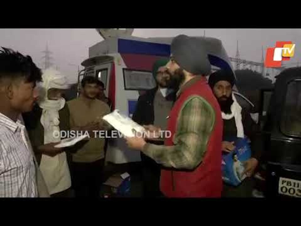 NRI Brothers Distribute Winter Garments To Protesting Farmers At Ghazipur Border