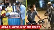 Mika Singh Gives Money To Needy While Cycling, Vivek Oberoi Distributes Food Packets To People
