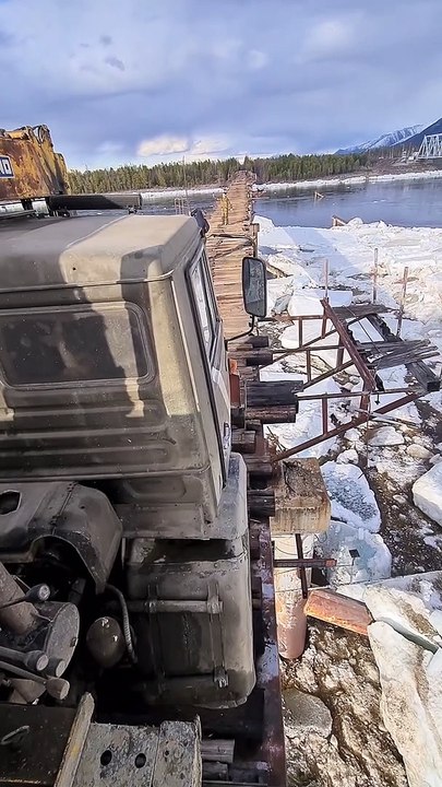 Truck Barely Fits on Narrow Bridge