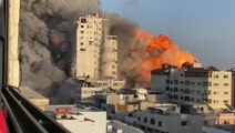 Watch footage of Israeli bombs destroying buildings in Gaza and rockets from Hamas targeting Israel