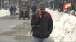 People Get Busy Removing Snow After Heavy Snowfall Witnessed In Srinagar