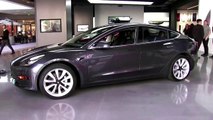 Tesla halts use of bitcoin for car purchases