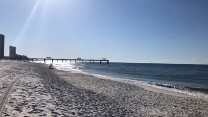 Sunshine and wind greet beachgoers in Alabama