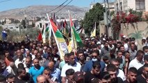 İsrail'in müdahalesinde hayatını kaybeden Filistinli genç Malik Hamdan için cenaze töreni düzenlendi