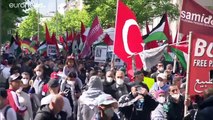 Clashes with police and Israeli TV reporter attacked at pro-Palestinian rally in Berlin