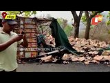 Edible Oil Laden Truck Overturns On Kalinga Ghat