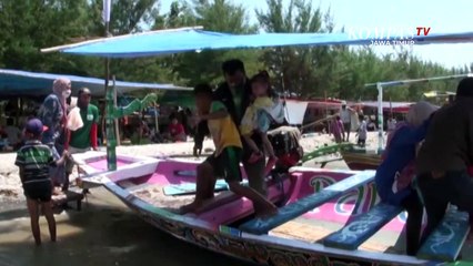 Libur Lebaran Pantai Nambangan Diserbu Warga