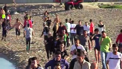 Llegan al enclave español de Ceuta un récord de 5.000 migrantes en un día