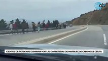 Cientos de personas caminan por las carreteras de Marruecos camino de Ceuta