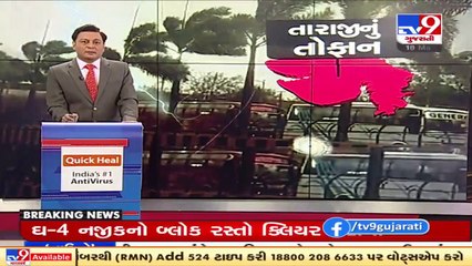 Viral Video _ Commuters escape unhurt after a hoarding falls on road near Parimal Garden, Ahmedabad