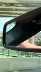 Vehicle Whacks Freeway Wall