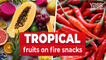 Tropical fruits on fire snacks
