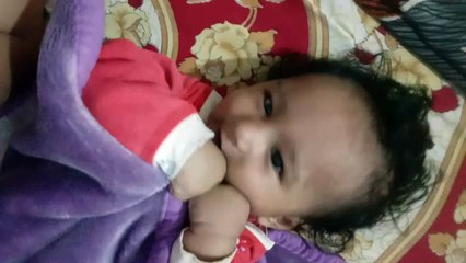 Cute baby playing with himself, very cute expression