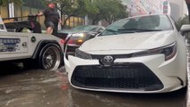 Cars totaled on flooded Miami streets